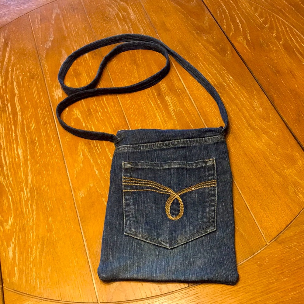 Upcycled denim crossbody with inside pockets and zipper